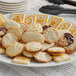 A plate of Pepperidge Farm assorted cookies on a table.