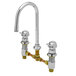 A chrome T&S metering faucet with two brass handles.