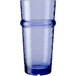 A close-up of a Libbey Tidal Blue plastic cooler glass with a curved rim.