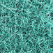 Spring-Fill teal crinkle cut paper shred. A close-up of shredded paper.