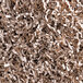A pile of brown Spring-Fill Kraft Monster Crinkle paper shred.