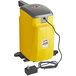 A yellow and grey Heinz Keystone countertop mustard pump dispenser with a cord.