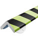 A black and yellow striped Ideal Warehouse H-Plus corner guard.