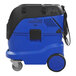 A blue and black Onfloor Dynavac Pro 1600IC industrial vacuum with wheels.