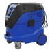 A blue and black Onfloor Dynavac Pro 1600IC dust collector vacuum on wheels.