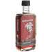 A bottle of Runamok coffee-infused maple syrup with a black cap.