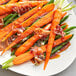 A plate of carrots and green beans with Runamok Merquen Smoked Chili Pepper-Infused Maple Syrup.