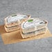 Priscilla's 5-Slice Spinach and Tomato Quiche slices on a brown paper bag.