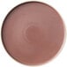 A smoky plum stoneware plate with a white rim.