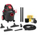 A black Shop-Vac wet/dry vacuum with yellow and black accessories.