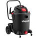 A black Shop-Vac wet/dry vacuum on wheels.