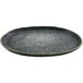 A round black cheforward melamine plate with white specks.