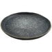 A black round cheforward melamine plate with white specks.