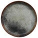 A close up of a black and gray cheforward by GET round woven melamine plate.