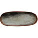 A white woven melamine platter with a rustic look.