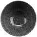 A black and white speckled cheforward ramekin.