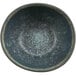 A cheforward melamine bowl with a speckled surface in Dusk and Spruce.