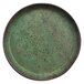 A green cheforward by GET melamine plate with brown spots on it.
