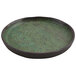 A green and brown cheforward melamine plate with a brown rim.