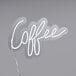 A white neon sign that says "Coffee" on it.