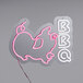 A Canvas Freaks neon sign with the word "BBQ" in pink and white.