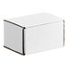 A small white corrugated mailer box with tuck top, measuring 6 by 3 by 2 inches.