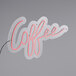 A Canvas Freaks neon sign that says "coffee" in pink neon on a white background with a dimmer.