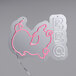 A neon sign with the word "BBQ" in white on a pink pig outline.