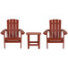 A group of red faux wood Adirondack chairs with a side table.