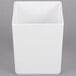 A white square container with a white lid.
