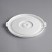 A white plastic lid with a round hole in the center.