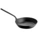 A Spring USA Black carbon steel fry pan with a black handle.