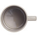 An American Metalcraft Unity beige Tritan coffee mug with a handle.