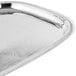 A Vollrath stainless steel oblong serving tray with a design on it.