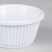 A white bowl with a ribbed rim.