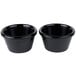 An American Metalcraft stainless steel cone basket with two black ramekins.