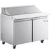 An Avantco stainless steel refrigerated sandwich prep table with two doors and extra deep cutting board.