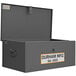 A grey Durham steel welder box with a white label on the front.