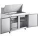 An Avantco stainless steel double door refrigerator with a cutting board.