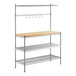 A chrome wire baker's rack with a stainless steel and wooden shelf.