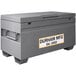 A gray Durham Mfg steel job site box with a white label.