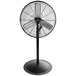 A black Tornado industrial pedestal fan on a white background.