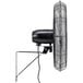 A black Tornado Pro Series metal wall fan.