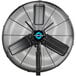 A close up of a black Tornado 24" outdoor oscillating metal wall fan.