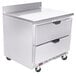 A stainless steel Beverage-Air worktop freezer with two drawers on wheels.