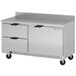 A Beverage-Air stainless steel worktop freezer with two drawers on wheels.