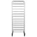 A white metal Winholt stainless steel platter cart with metal bars and wheels.