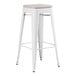 A Lancaster Table & Seating white outdoor backless barstool with a gray cushion.