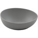 A light gray irregular round melamine bowl.