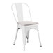 A Lancaster Table & Seating white metal outdoor cafe chair with a gray cushion.